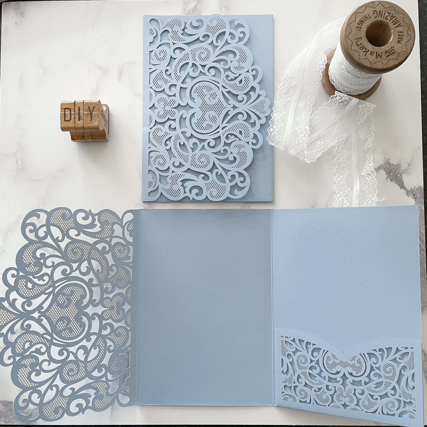 Amelie Laser Cut Pocket Invitation in Pale Blue