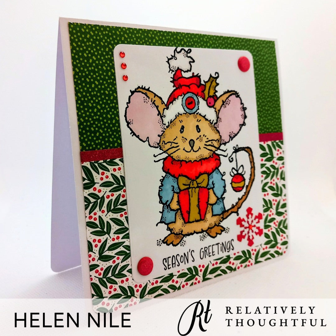 A Christmas Mouse Card made by Helen Nile for Relatively Thoughtful using Woodware Francoise Read Stamp. Red, Green, Blue and Brown colours.