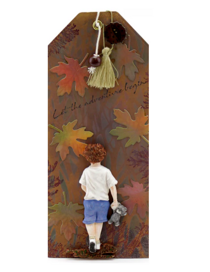Decorative tag with a child and autumn leaves design on a white background