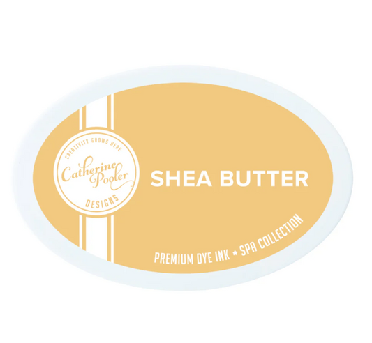 Shea butter ink pad with 'Catherine Pooler Designs' branding on a white background