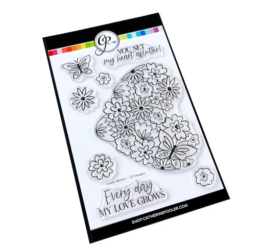 Clear stamp set with floral and butterfly designs on a white background